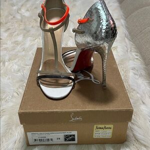 Christian Louboutin Silver Python Heels with Red Soles
